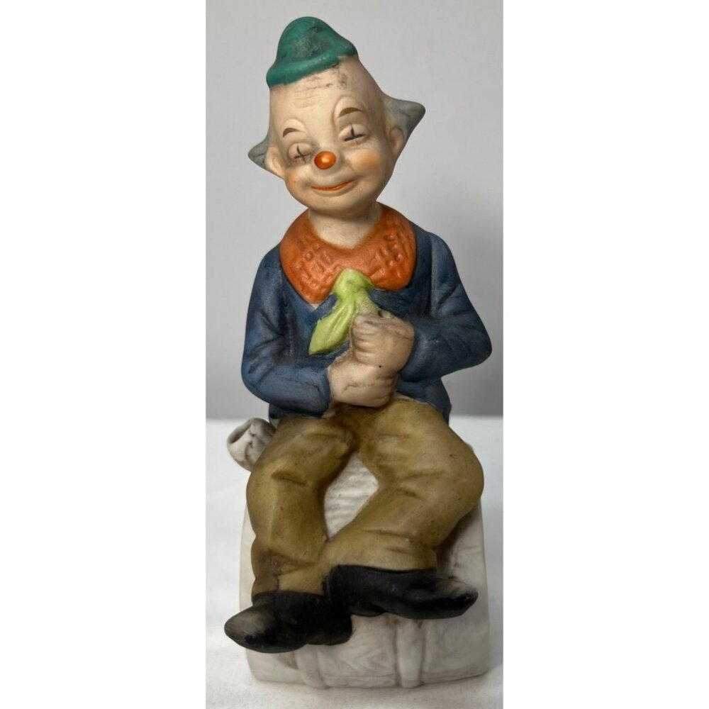 Vintage Porcelain Clown Figurine Holding Banana